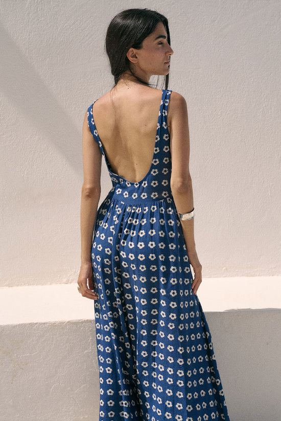 Veda Dress Indigo — studio back view, model showing open low back detail of indigo hand block print linen blend midi dress with botanical motif, minimal white background, artisan Jaipur India | Daughters of India